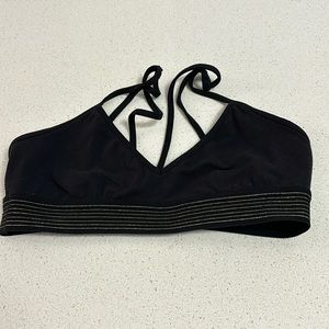 Lululemon sports bra size 2 good condition black with gold trim